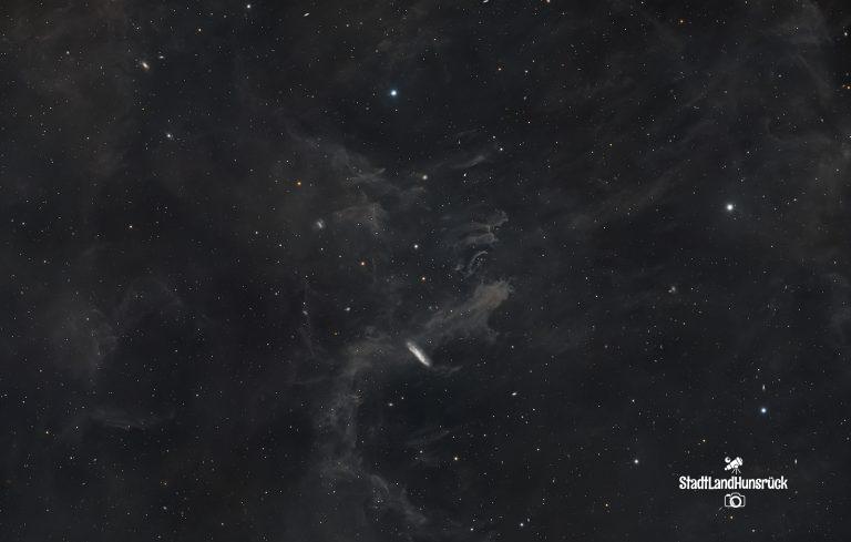 NGC 7497: Eine Galaxie im kosmischen Schleier